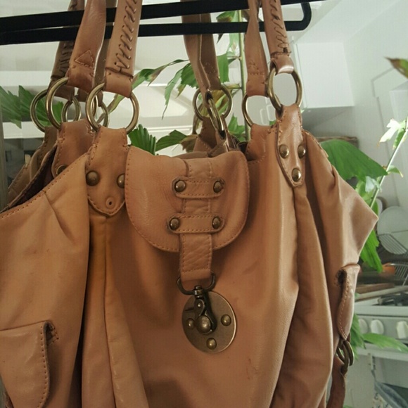 Gorgeous Linea Pelle collection hobo bag
