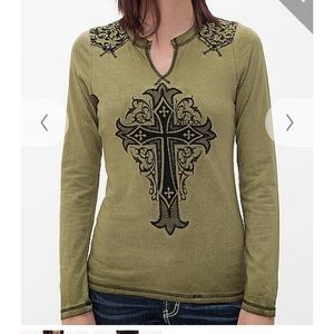 Green and black Affliction shirt.