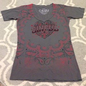 Red and black Affliction shirt.