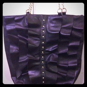 DSW Black Faux leather bag w gold chain straps.