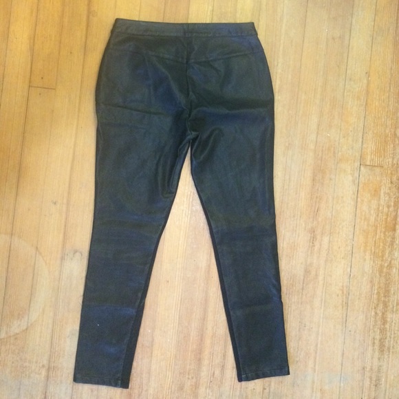 Black "leather" skinny pants w gold zipper pkts