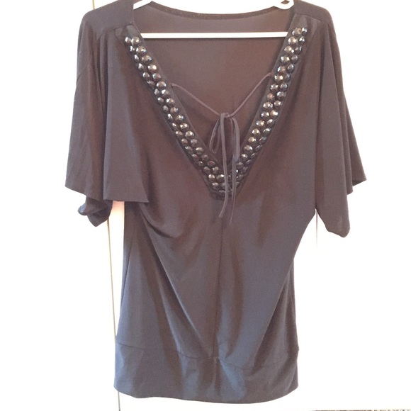 Cute black top with jewel accents (jewels on back)