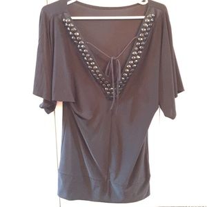 Cute black top with jewel accents (jewels on back)