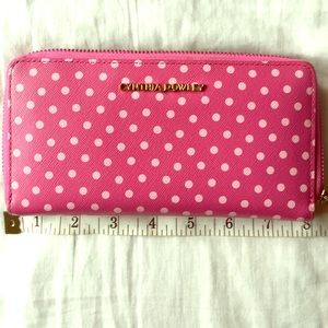 Pink and white polka dot Cynthia Rowley wallet.