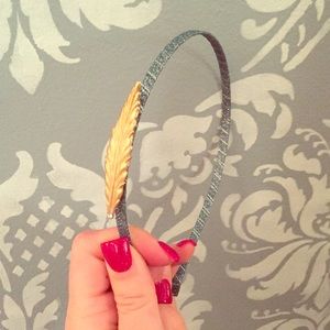 Blue head band with feather