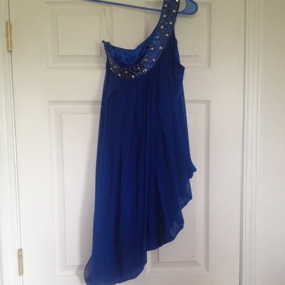 Electric blue dress. Prices are low and firm.