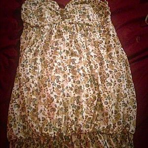 Sweet spaghetti strap, cinches at bottom dress