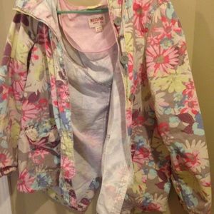 a floral covered coat.