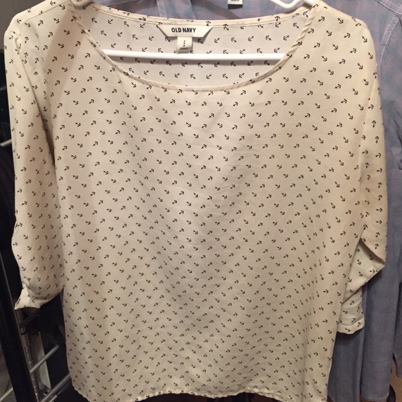 White/creamish blouse with blue anchors