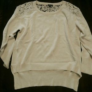 Cream sweater with crochet detail