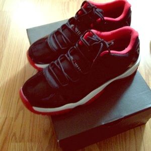 Jordan "Bred" 11's. Red & Black low tops.