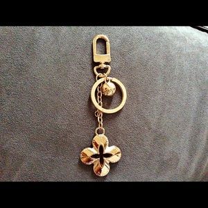 Gold eclipse bag / purse charm