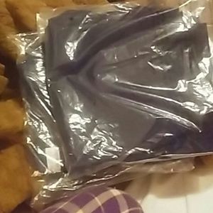 Two Pair of school pants girls size 10 plus.