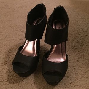 Stylish black leather wedges! Size 6. Worn once.