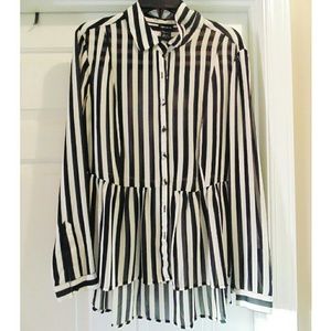 Plus size black and white striped peplum top
