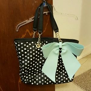 teal bow betsey johnson purse.
