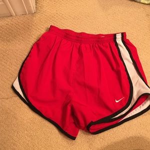 Small red Dri-fit Nike shorts