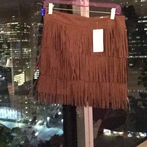 Never worn faux suede brown fringe skirt