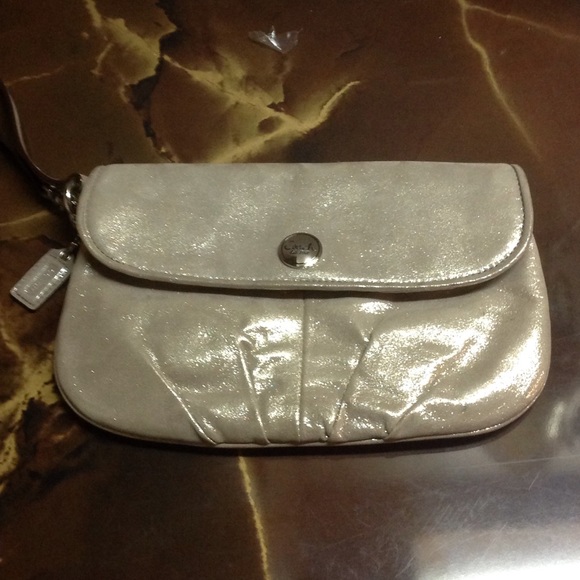 Coach Handbags - Authentic Coach gold metallic purse / wrist