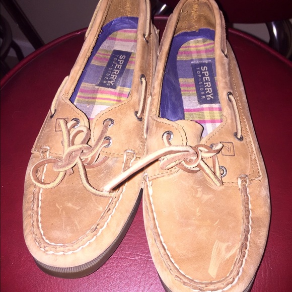 Genuine Tan Sperrys with plaid inserts.