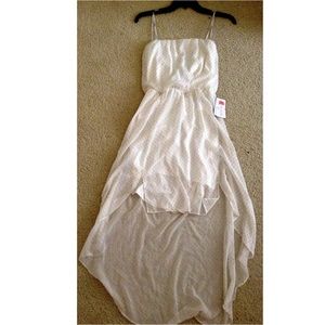 Flowy high-low white dress with gold polka dots