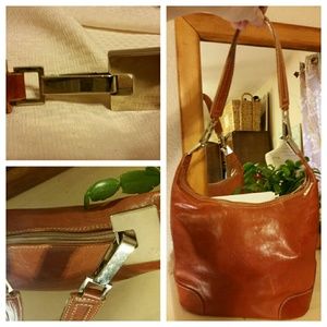 Gorgeous reddish leather handbag.
