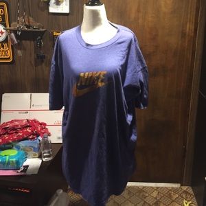 Two men's Nike shirts