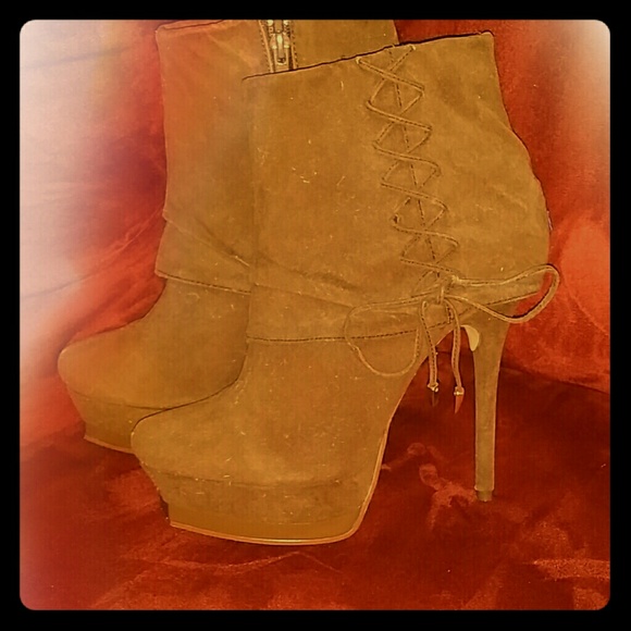 Suede like booties, never worn before.