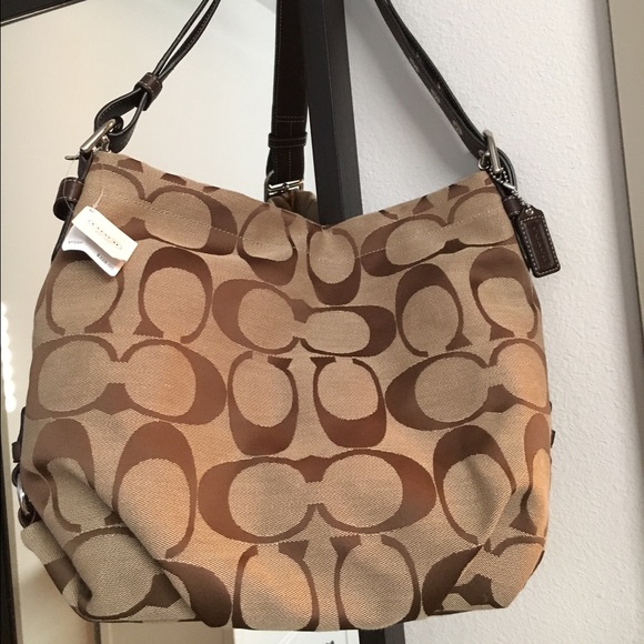 Brand New with tags Coach purse never worn!