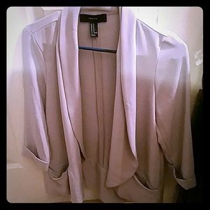 grey/silver blazer with open front.