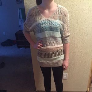 Sweater that is lighter in colors