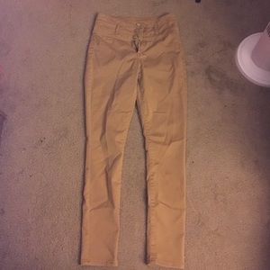 Mustard high waist jeans and acid wash