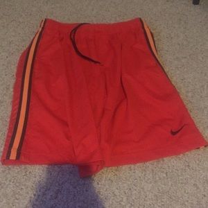 Orange Nike athletic shorts