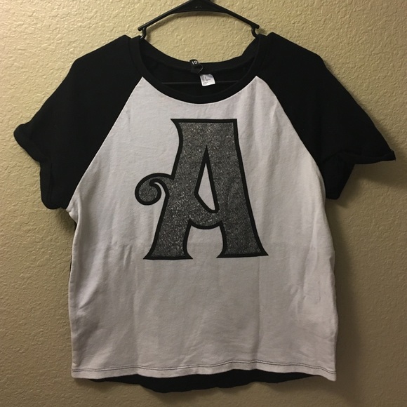 Letter A shirt.