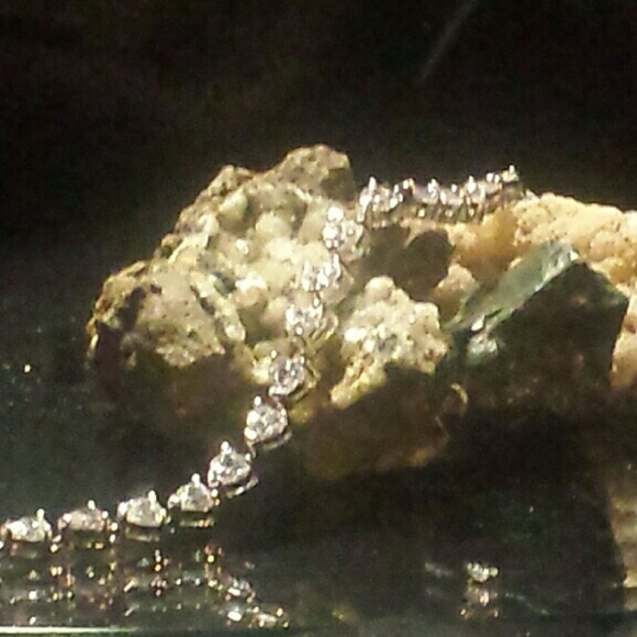 Silver and heart shaped cz tennis bracelet