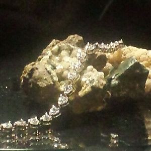 Silver and heart shaped cz tennis bracelet