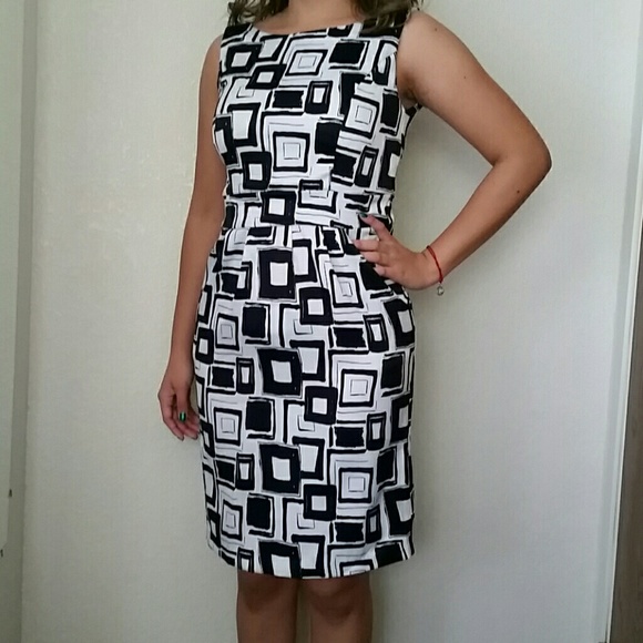 Knee length dress.