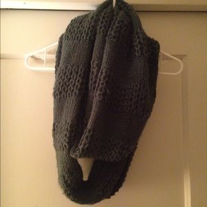Olive green knit infinity scarf.
