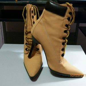 Adorable lace up high heel boots