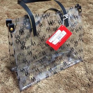 Brand new. Never used Dooney and Bourke purse.