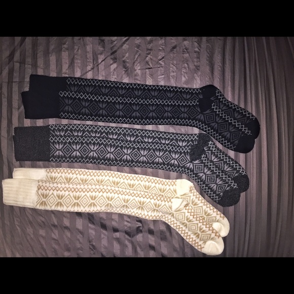 A 3 pair set of cozy knee high socks with patterns