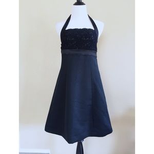 Limited Edition black halter lace dress.
