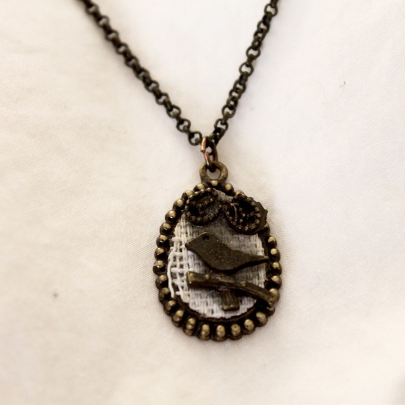 metal bird charm necklace