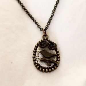 metal bird charm necklace