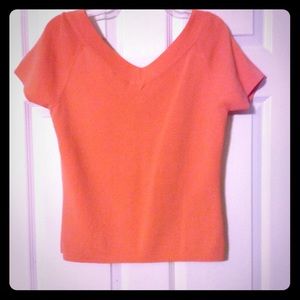 Peach colored knit top