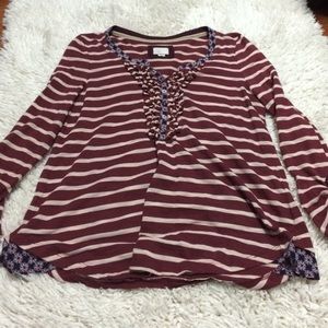 Striped with Ruffles long-sleeve top.