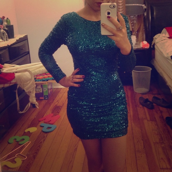 Emerald green sequins dress.
