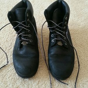 Timberland boots, all black.
