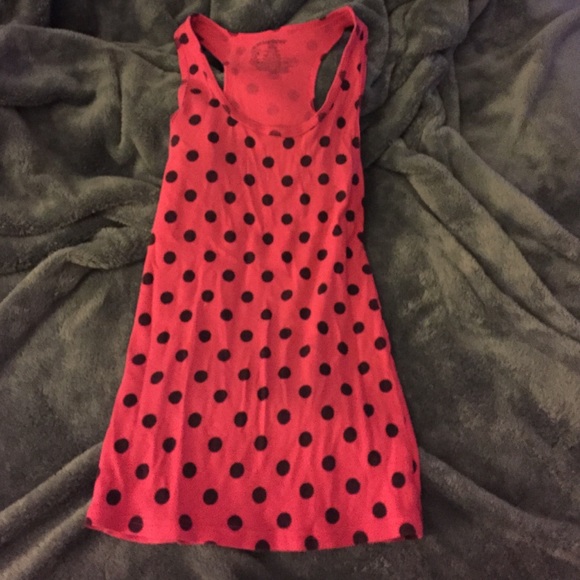 Pink and black polka dotted tank top