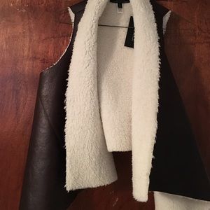 Fur and leather vest